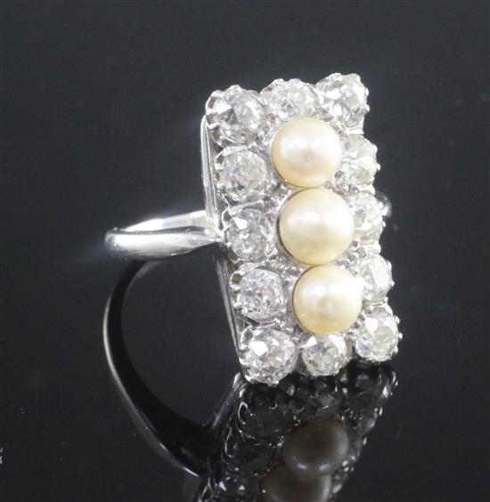 An Art Deco white gold, diamond and cultured pearl rectangular tablet ring, size L/M.